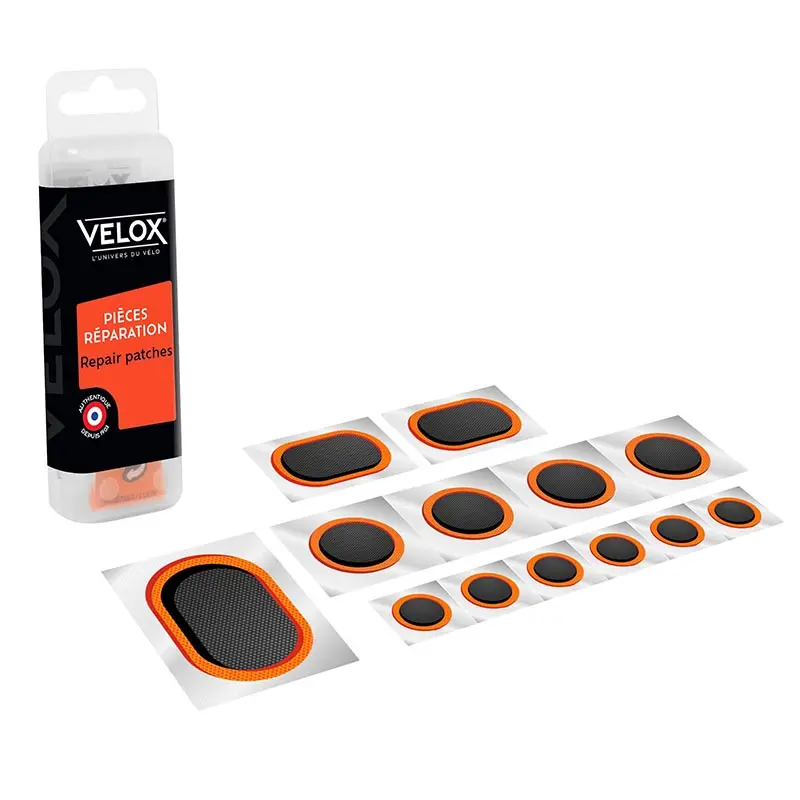Kit réparation chambre à air Velox route autocollantes - Boîte (6 patchs 15 mm + 4 patchs 25 mm + 2 patchs 24x34 mm + 1 patch 32x50 mm)